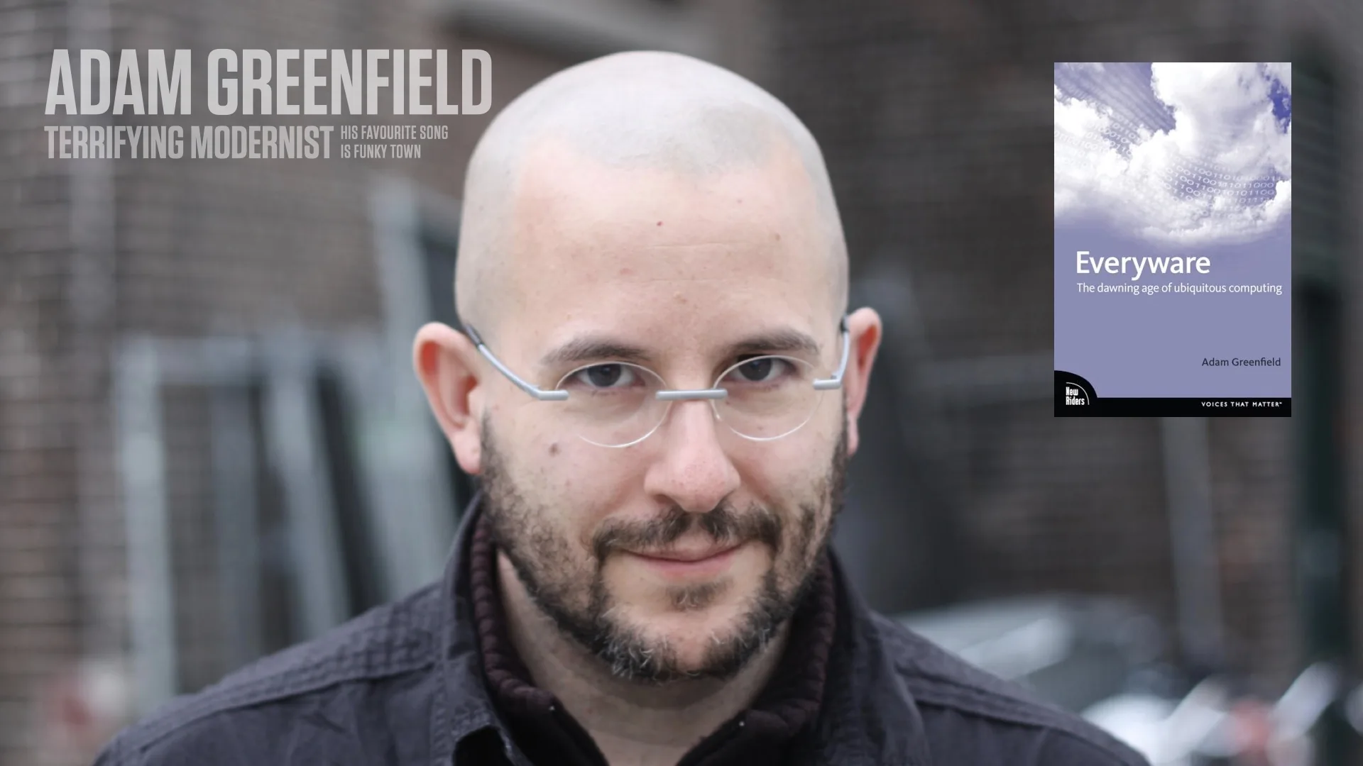 Slide reading: ADAM GREENFIELD TERRIFYING MODERNIST HIS FAVOURITE SONG IS FUNKY TOWN.