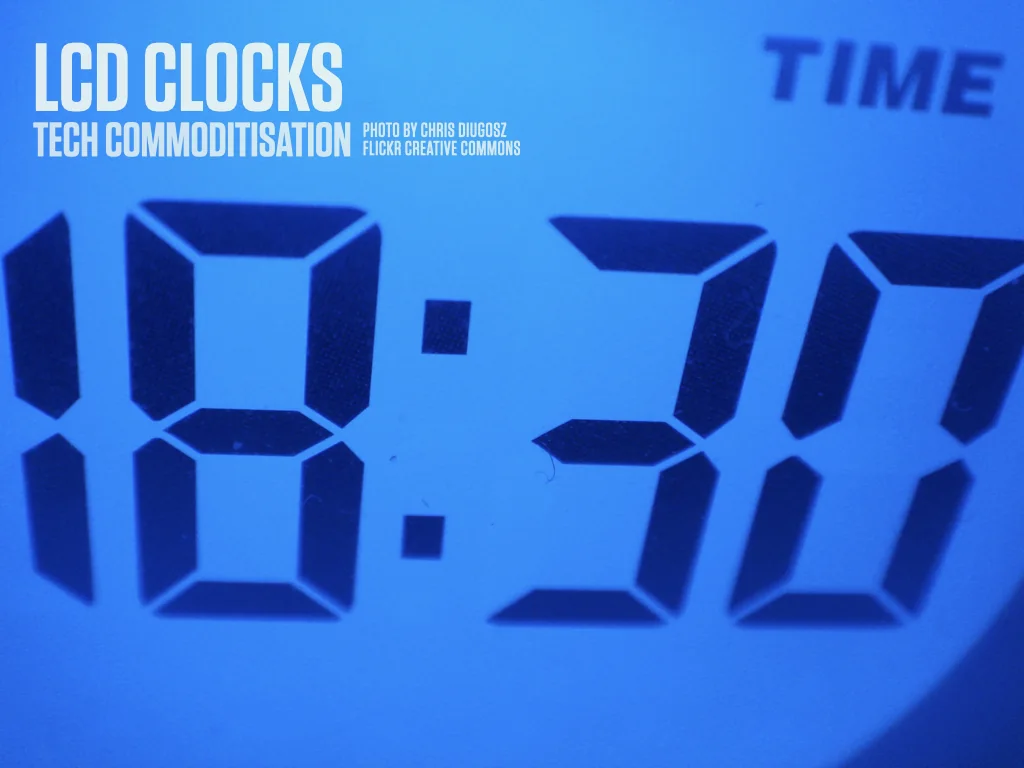 Slide reading: LCD CLOCKS TECH COMMODITISATION PHOTO BY CHRIS DIUGOSZ FLICKR CREATIVE COMMONS.