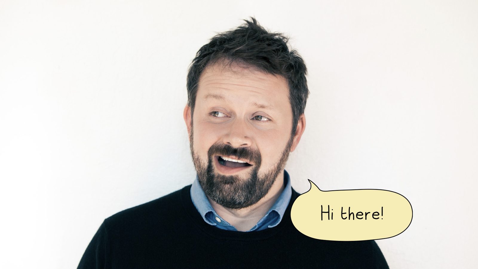 Portrait of Tom Coates with a speech bubble reading Hi there!