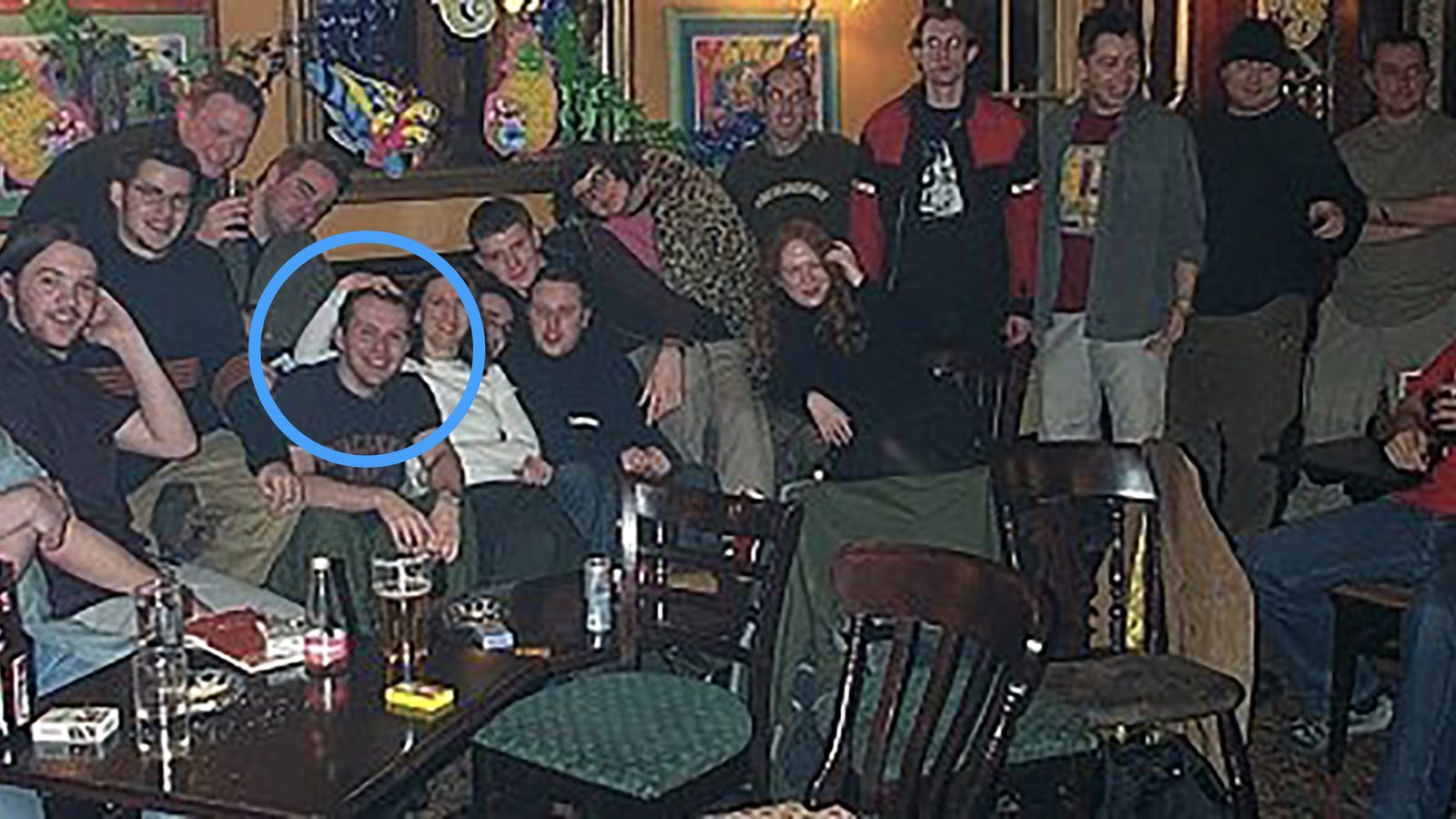 Group photo of early London bloggers in a pub, with Tom Coates highlighted in a blue circle.