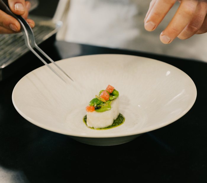 A dish receiving its finishing touches at La Bastide, Capelongue.