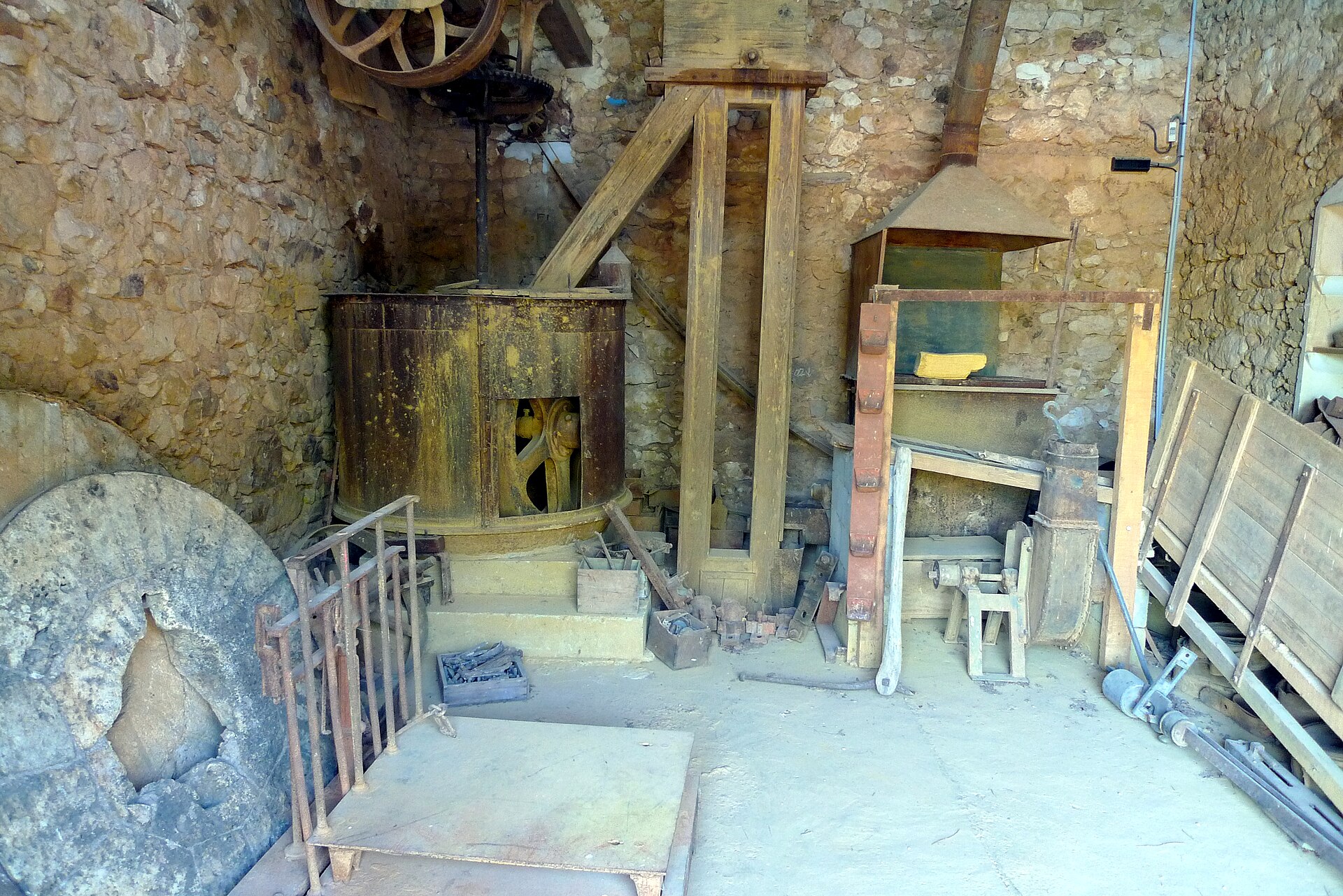 Historic grinding machinery inside the former Mathieu ochre factory